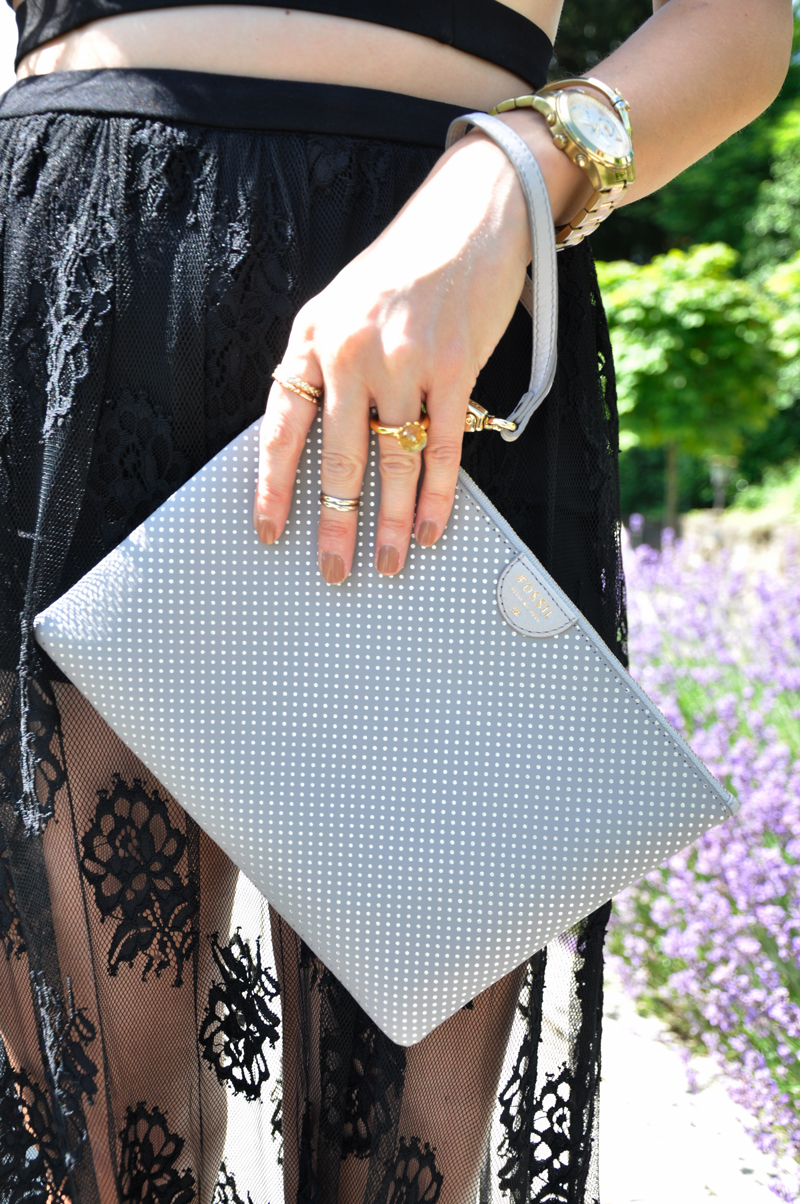 Black transparent skirt from Forever 21 with a black cropped top also from Forever 21. The clutch is from Fossil and the sunglasses from a fleamakret. A gold watch from guess and the finger-rings were a gift.