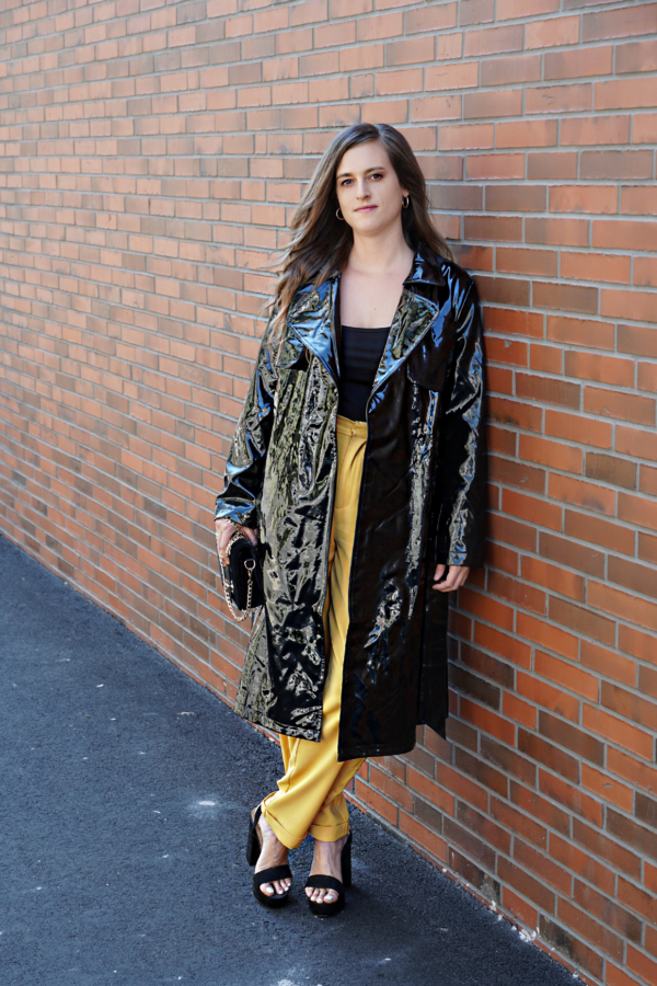 Black patent coat with yellow pants