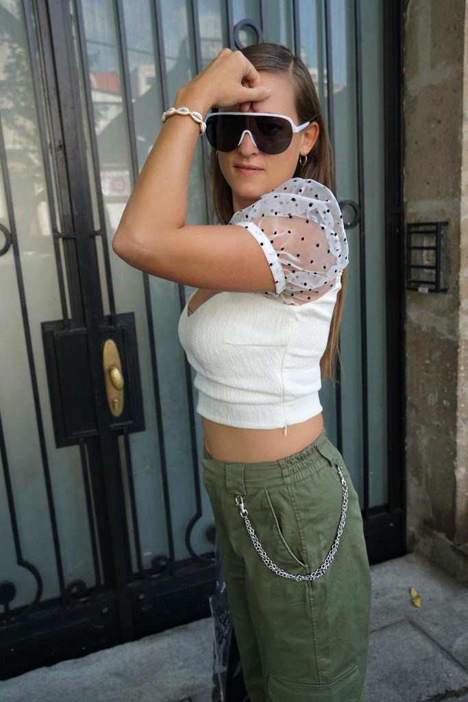 Andrea Steiner from fashion blog Strawberries 'n' Champagne based in Switzerland is wearing puffy sleeves with cargo pants.