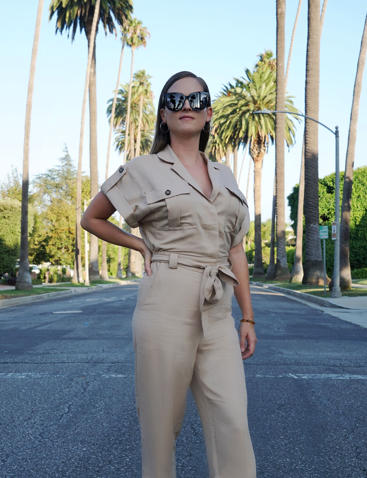 Andrea Steiner, fashion Blogger from Strawberries 'n' Champagne based in Switzerland is wearing a utility overall with socks and High Heels.