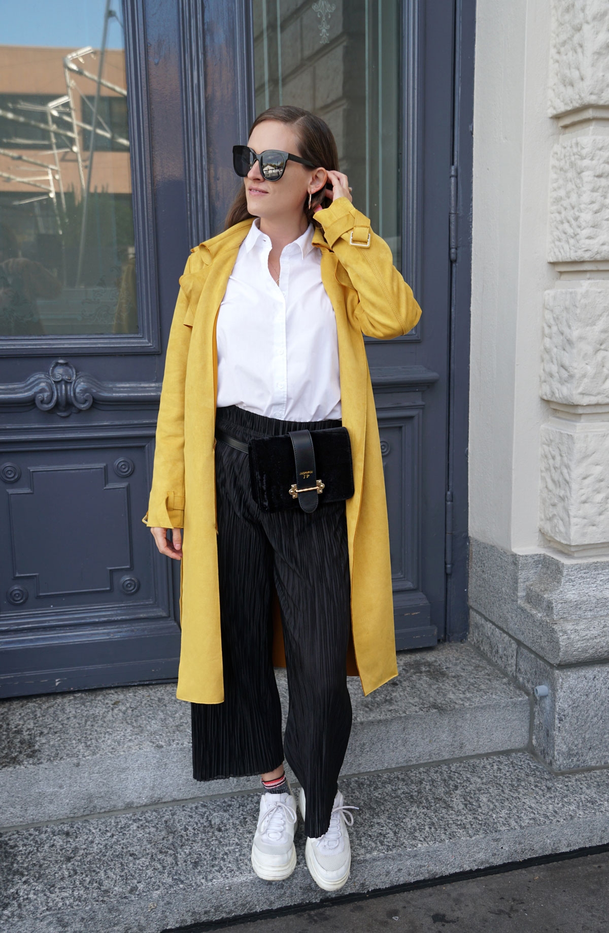 Andrea Steiner, fashion blogger from Strawberries 'n' Champagne based in Switzerland is wearing a must have you need to have in your wardrobe: a white blouse.