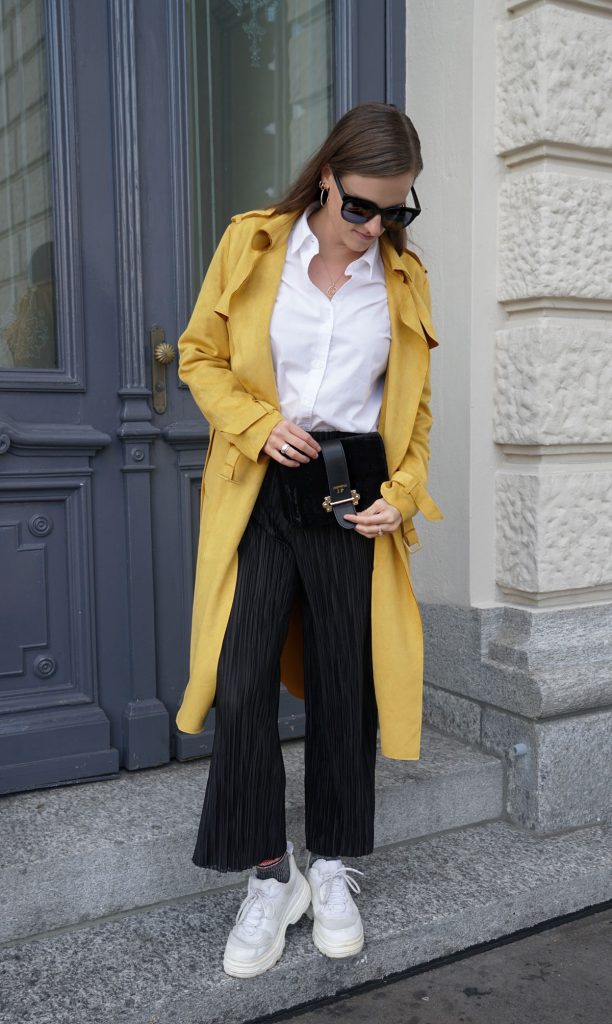 Andrea Steiner, fashion blogger from Strawberries 'n' Champagne based in Switzerland is wearing a must have you need to have in your wardrobe: a white blouse.