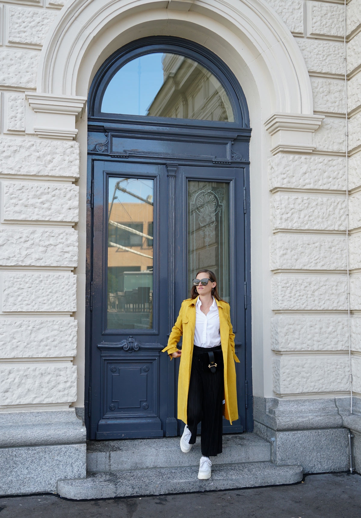 Andrea Steiner, fashion blogger from Strawberries 'n' Champagne based in Switzerland is wearing a must have you need to have in your wardrobe: a white blouse.
