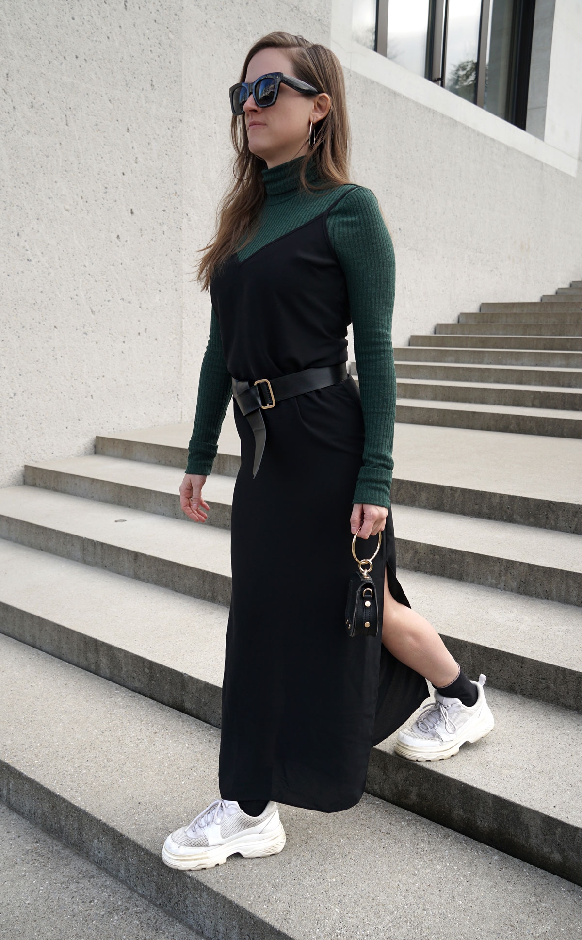 Andrea Steiner from fashion blog Strawberries 'n' Champagne based in Switzerland shows you how you can reuse your old black dress.