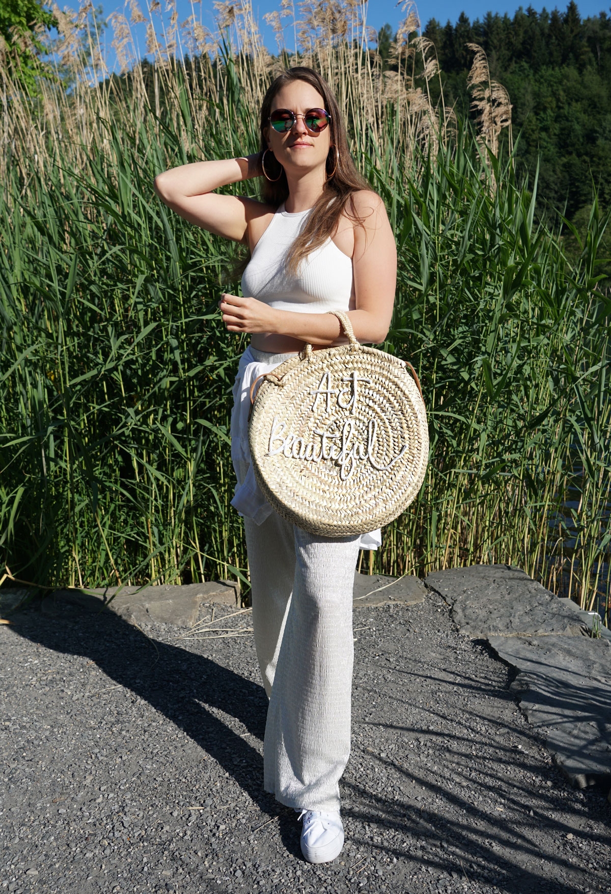 Andrea Steiner from Strawberries 'n' Champagne based in Switzerland is wearing a complete white look.